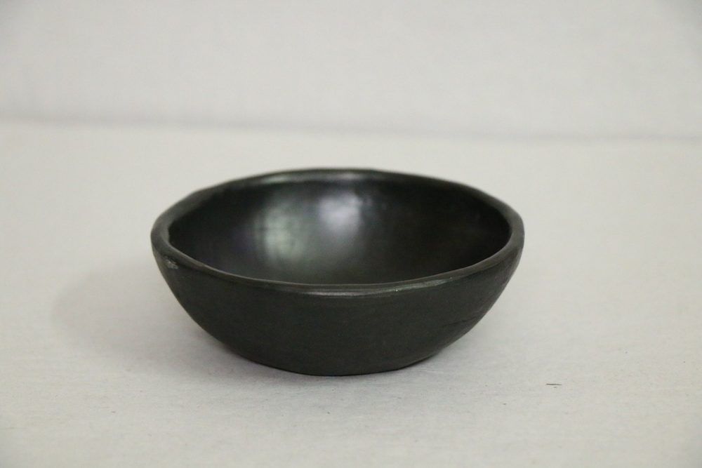 black pottery bowl